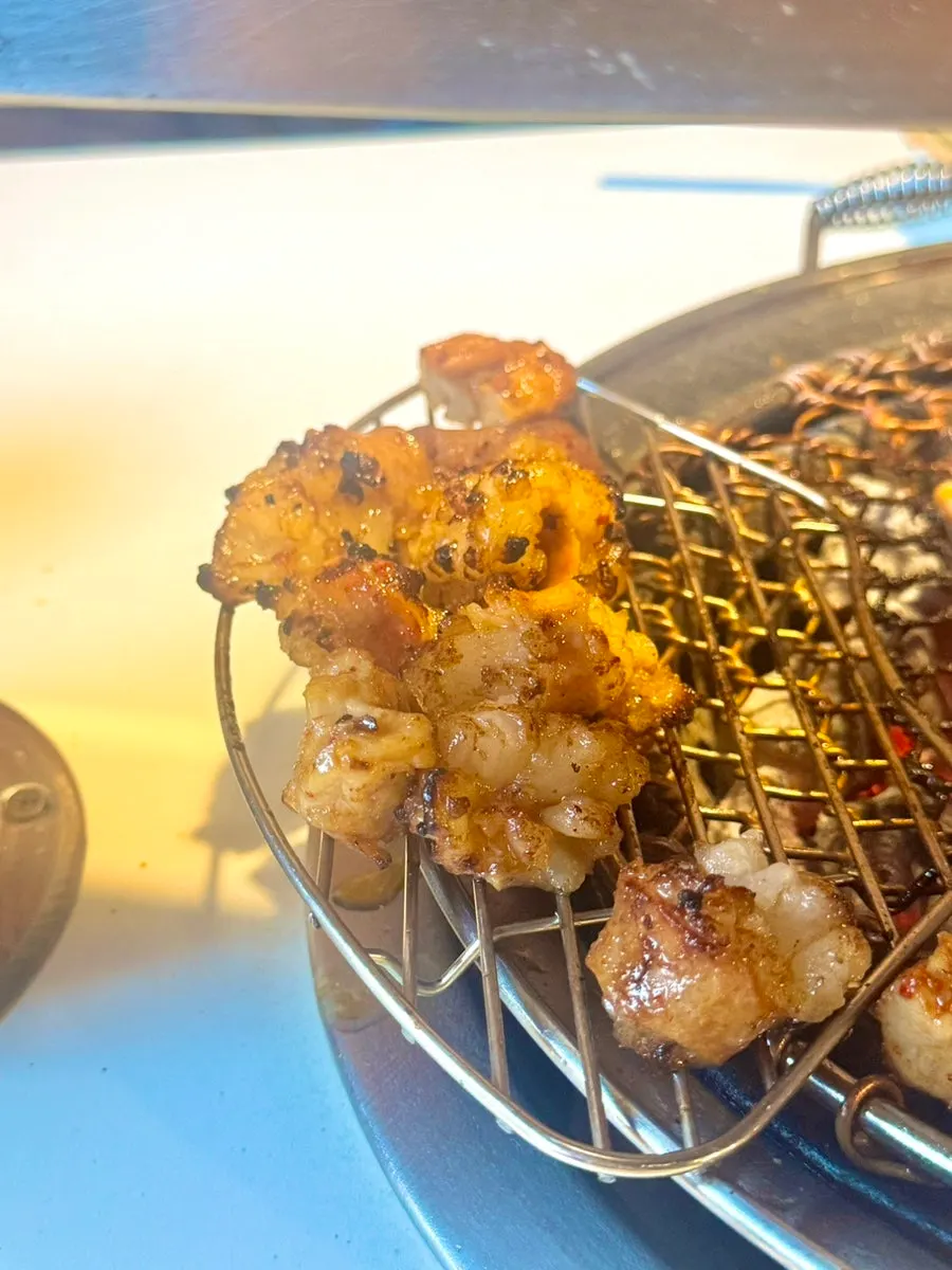 Whole daechang placed on the charcoal grill