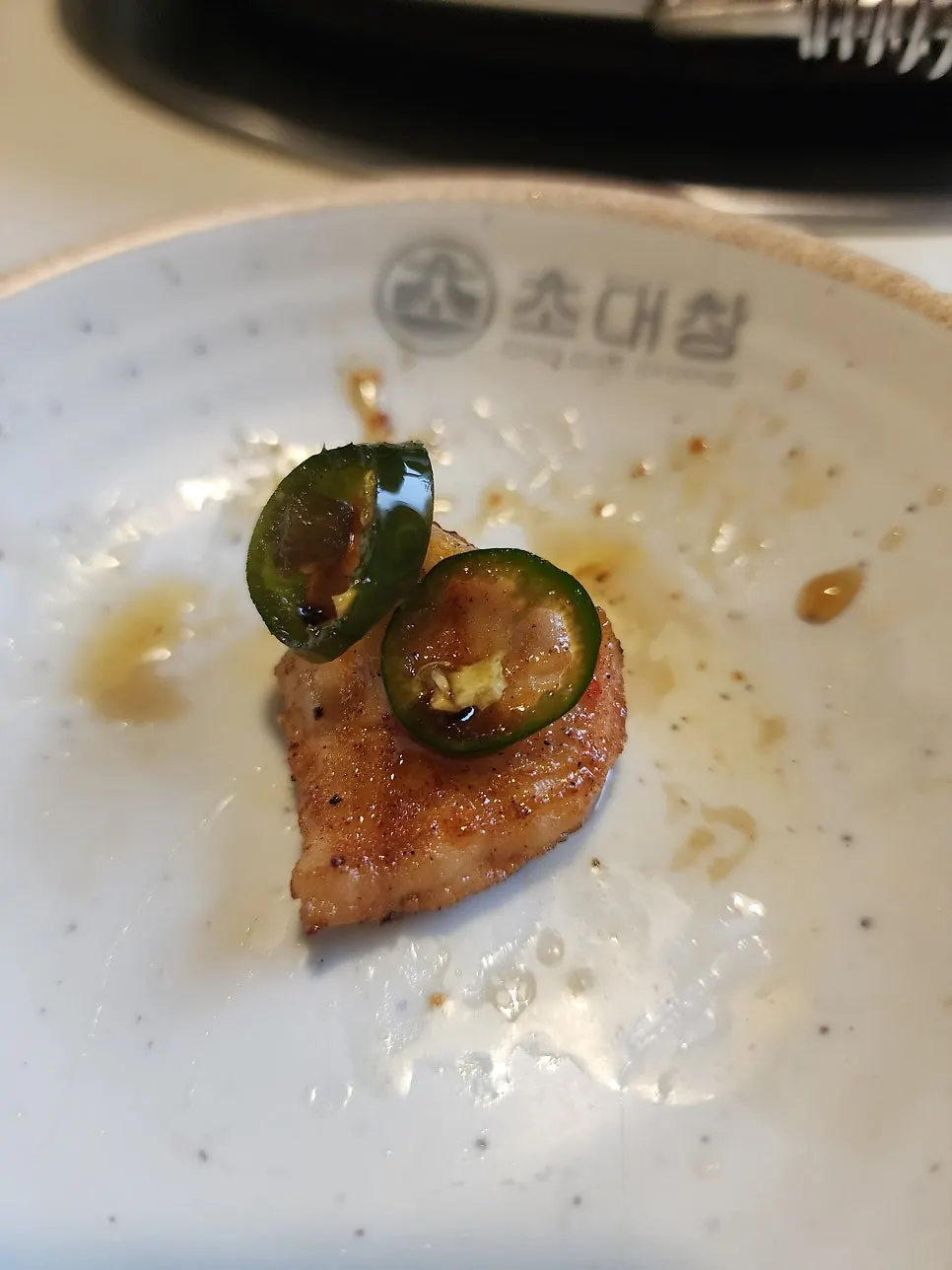 網に残った大腸・特陽・ホルモンの焼き物
