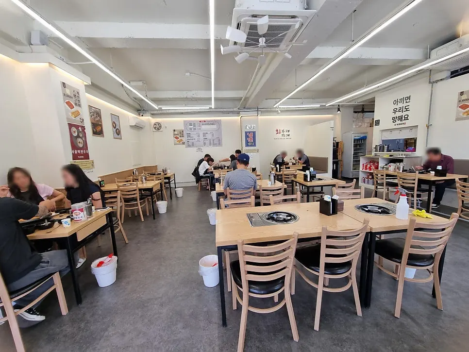 Bright, clean interior seating at Choi Budae Jjigae