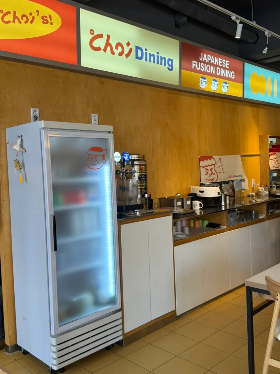 Menu board seen from the entrance of Choi Dining Gwanpyeong