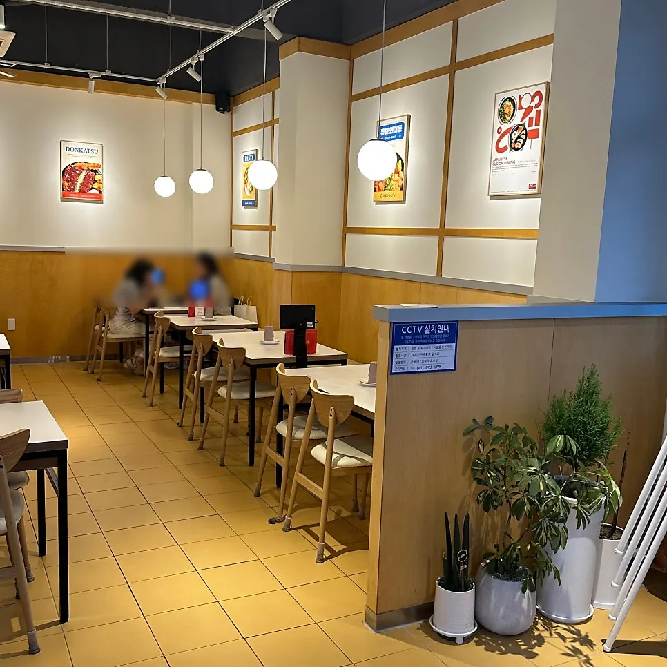 Clean, cozy interior seating at Choi Dining