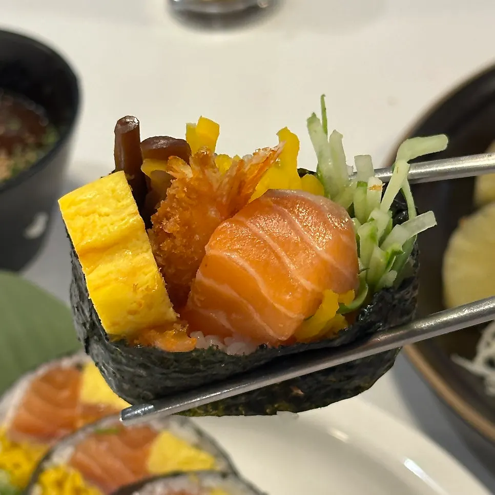 Aged salmon futomaki packed with fillings