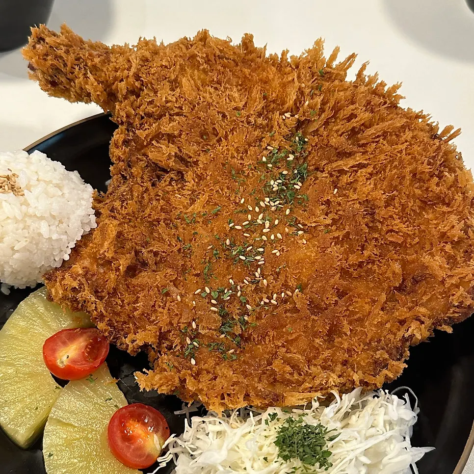 A plate of Choi bone-in pork katsu
