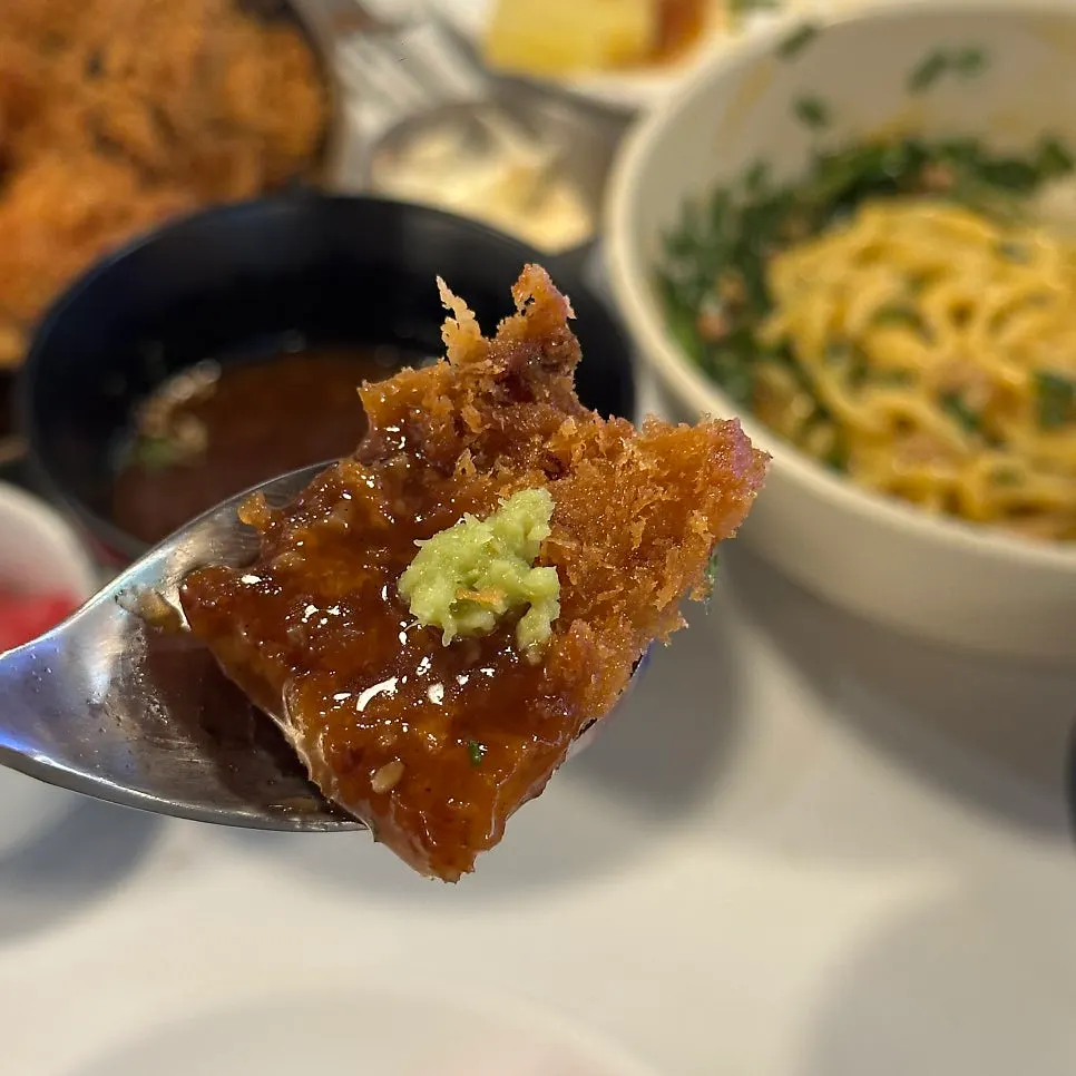 Cross-section of the crispy fried bone-in pork katsu