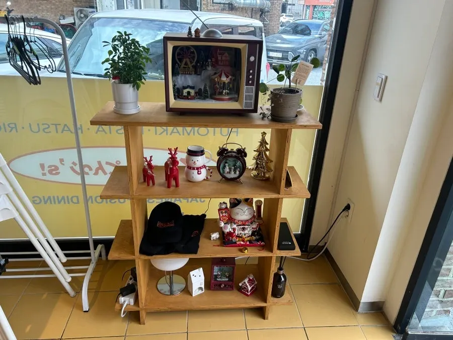 Seating area inside the restaurant with cute decorative items