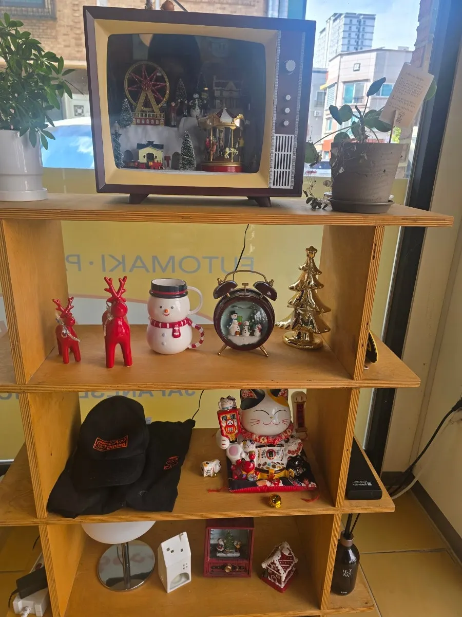 Decorative items displayed on one side of the restaurant