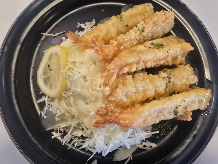 Lemon cream shrimp served over shredded cabbage