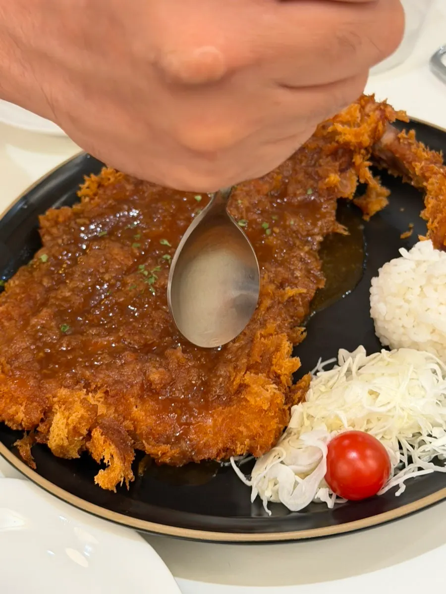 Choi bone-in tonkatsu with rib bone attached