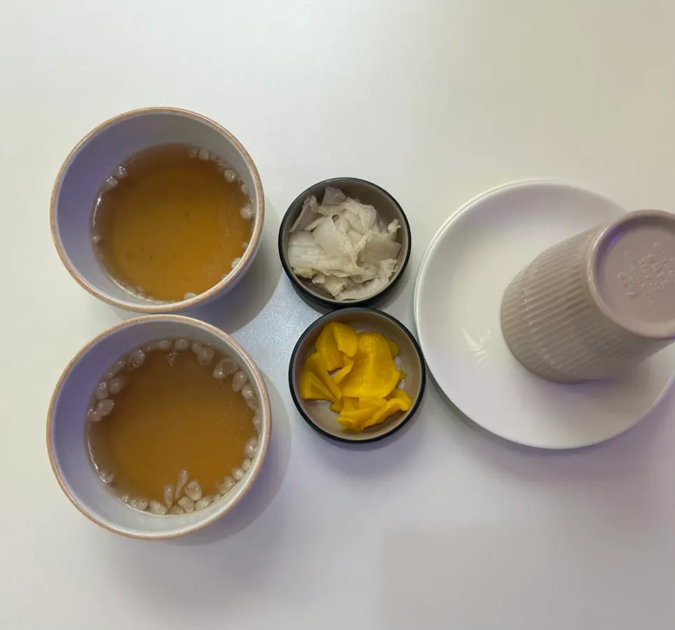 Basic side dishes: pickled radish, white kimchi, and broth