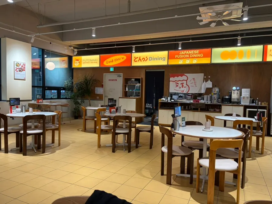 Interior of Choi Dining with wide table spacing