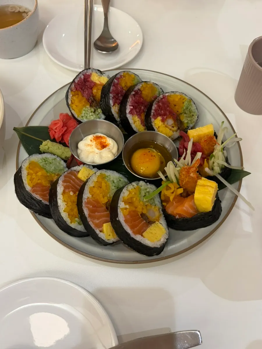 Salmon futomaki and yukhoe futomaki served together