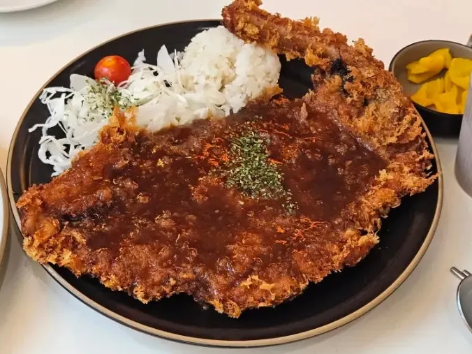 Pork jowl wild garlic oil pasta and bone-in tonkatsu set together