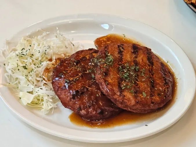 Hamburg steak placed alongside the mains