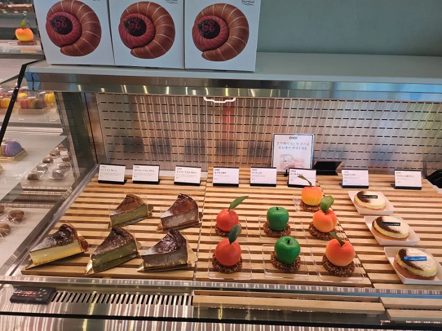 Showcase of slice cakes and desserts at Choi Main Branch