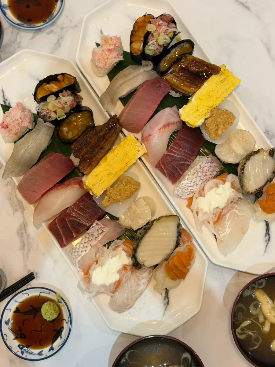 Rakkyo, ginger, and soy sauce set out on the table
