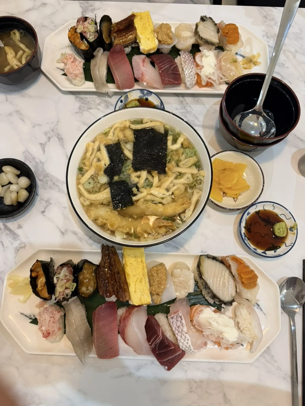 Fried tofu soup served alongside the premium sushi set