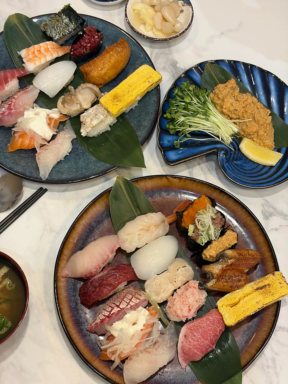 Table laid out with sushi and tempura