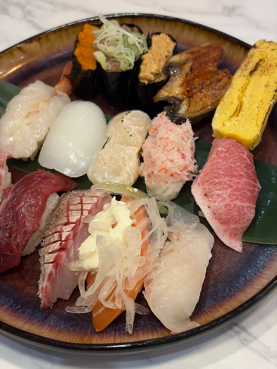 Close-up of mixed sushi with large toppings