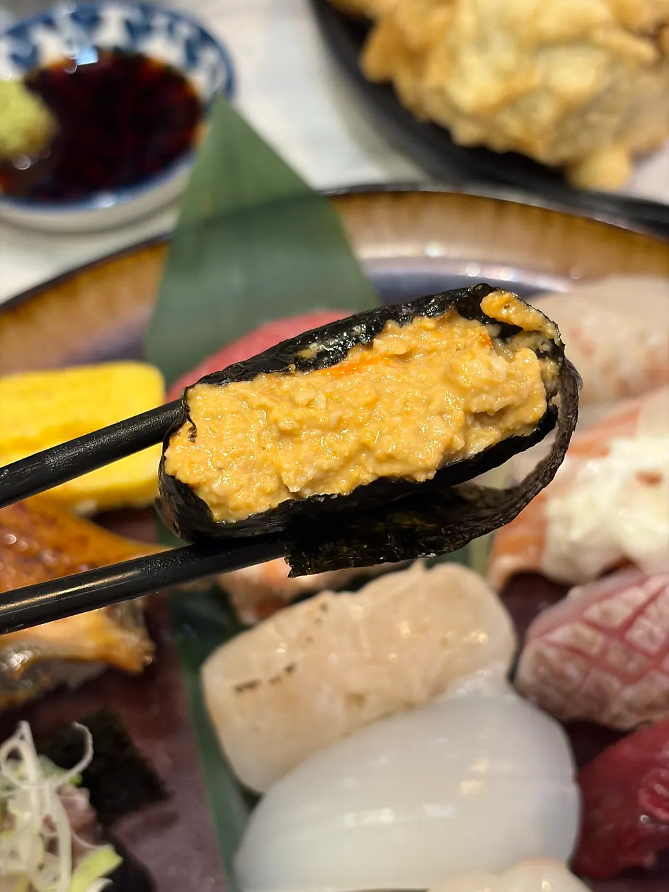 Three gunkan varieties on the special sushi: uni, negitoro, and ankimo