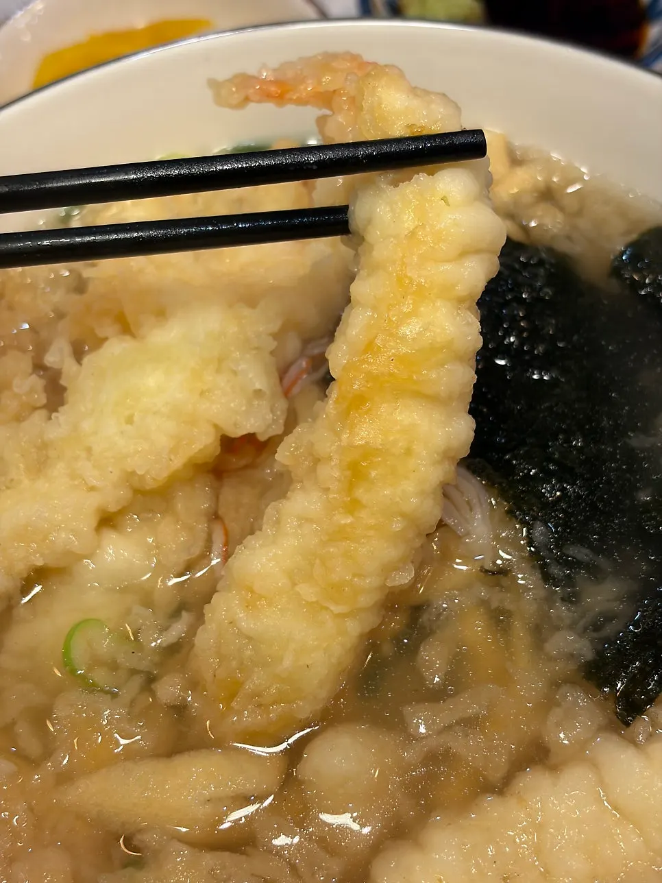 Udon topped with shrimp tempura and crab tempura