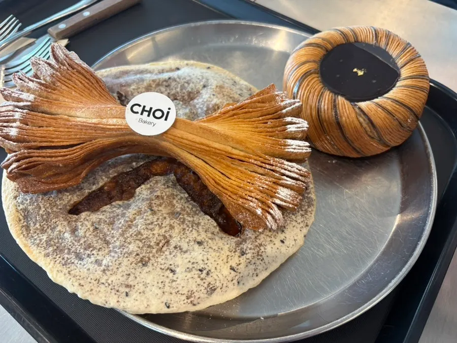 Table setting with pastries and drinks at Choi