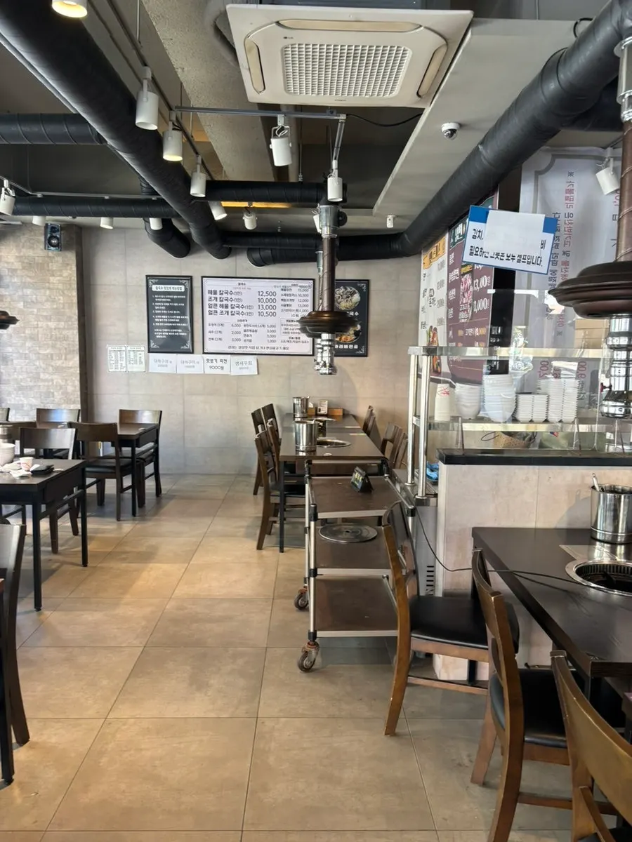 Table seating further inside the restaurant
