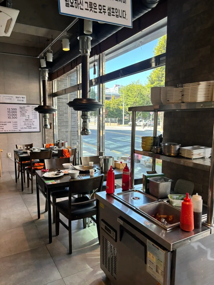Self-serve bar with kimchi and sauces