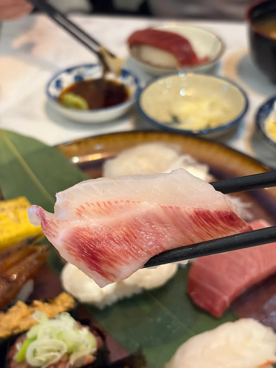 Scored squid sushi