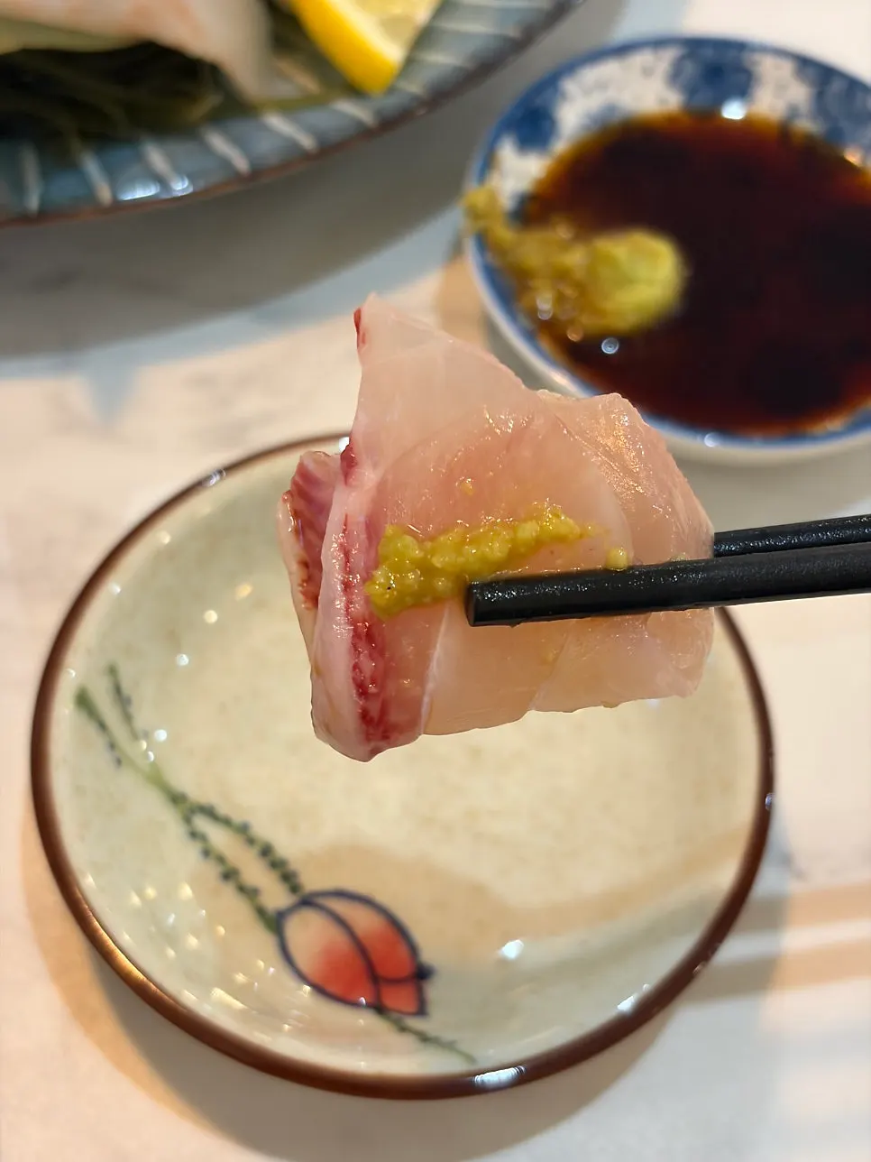 A piece of clean-tasting white fish sushi