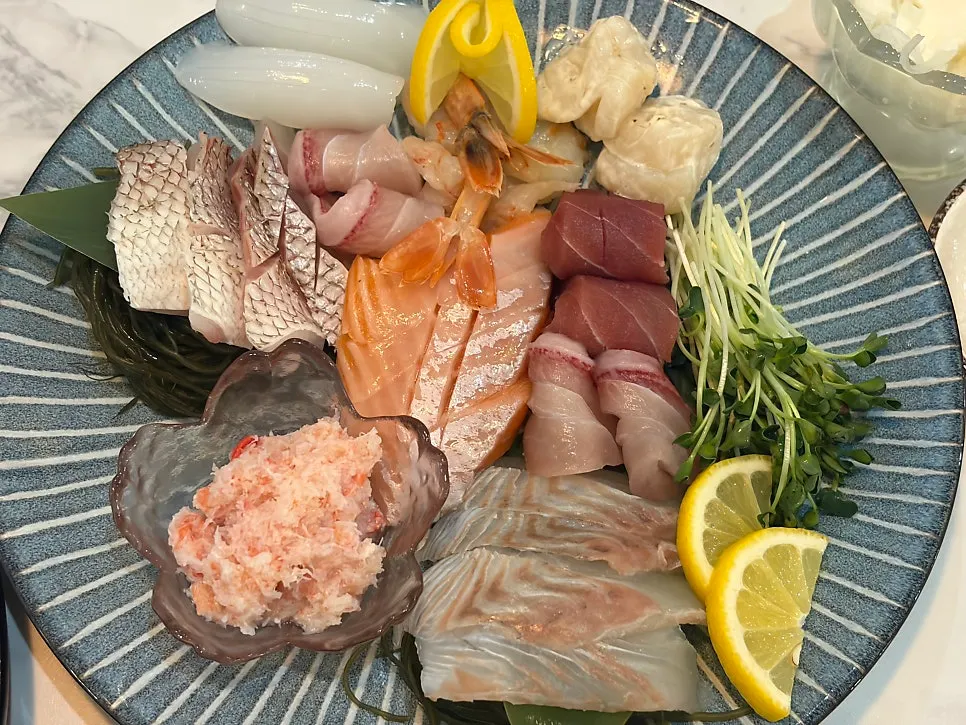 Mixed sashimi with flounder, red seabream, tuna, and salmon
