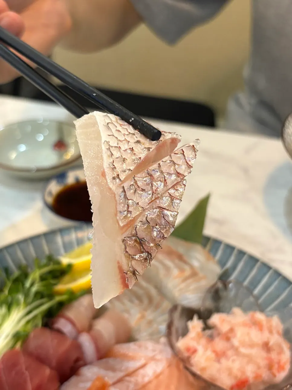 Red seabream sashimi sliced with the skin left on