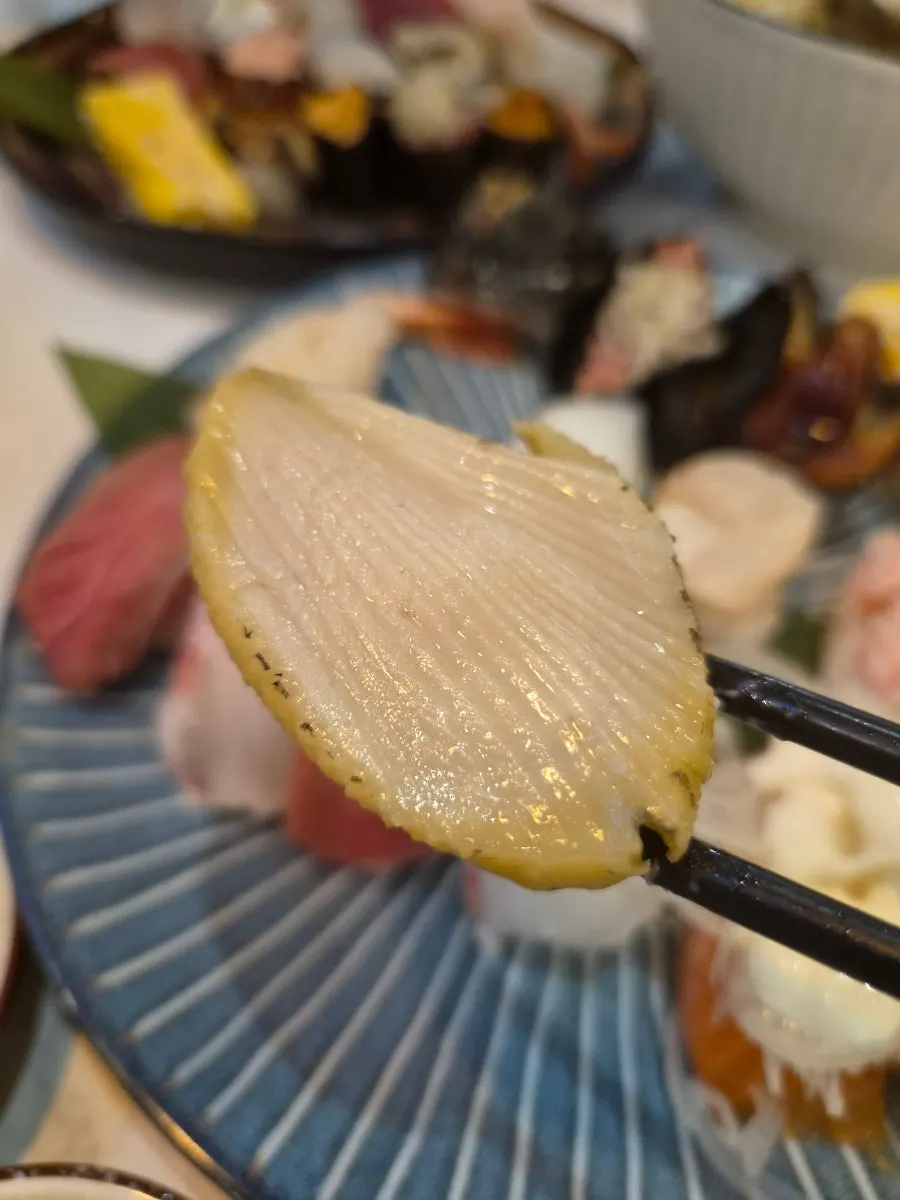 Part of the premium sushi set with abalone and sea cucumber intestine