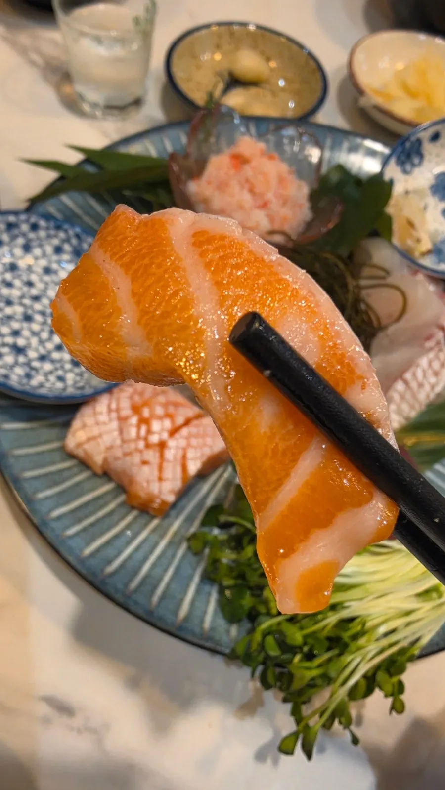 A drink paired with sashimi