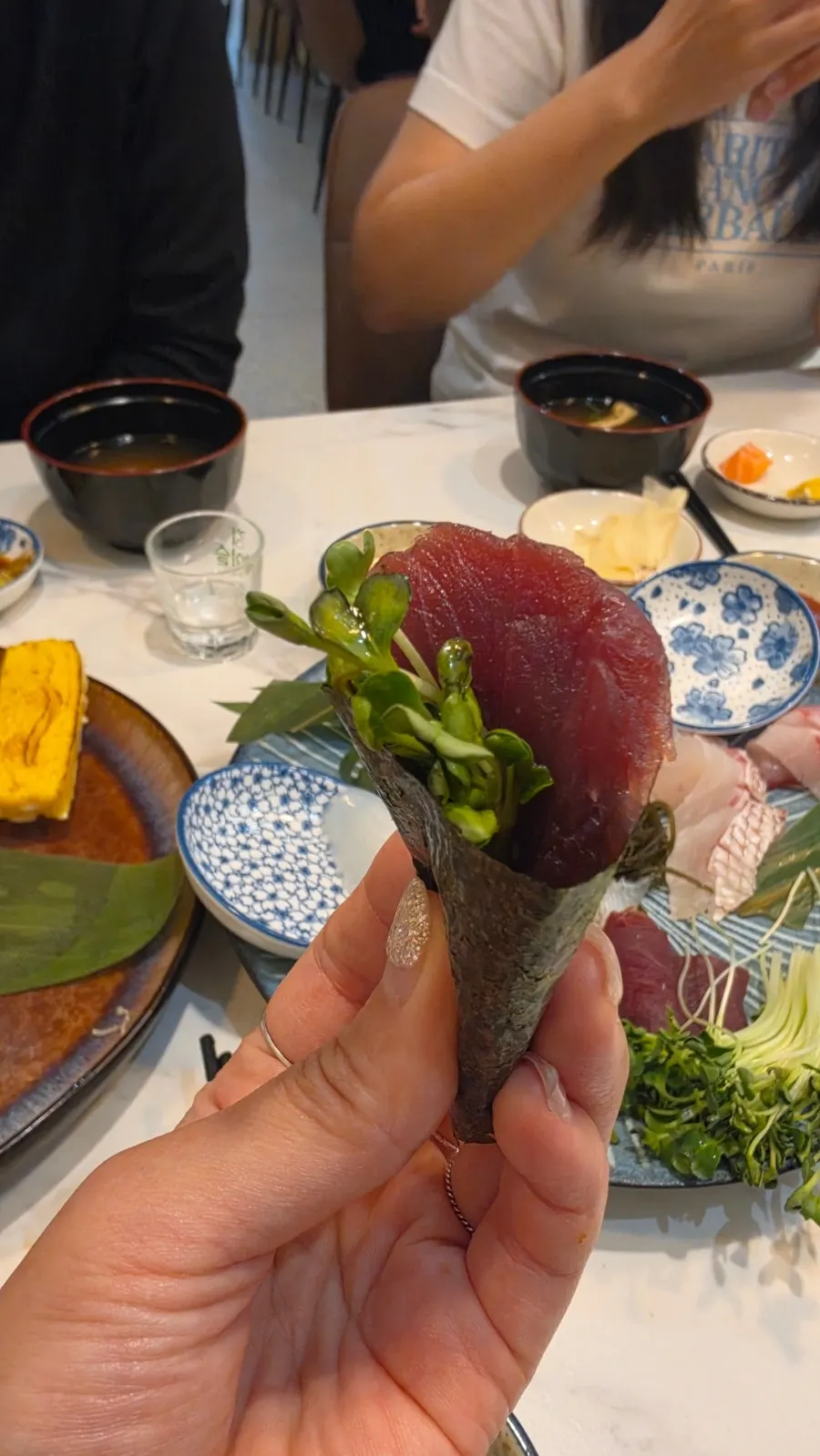 Sashimi wrapped in seaweed makizushi-style