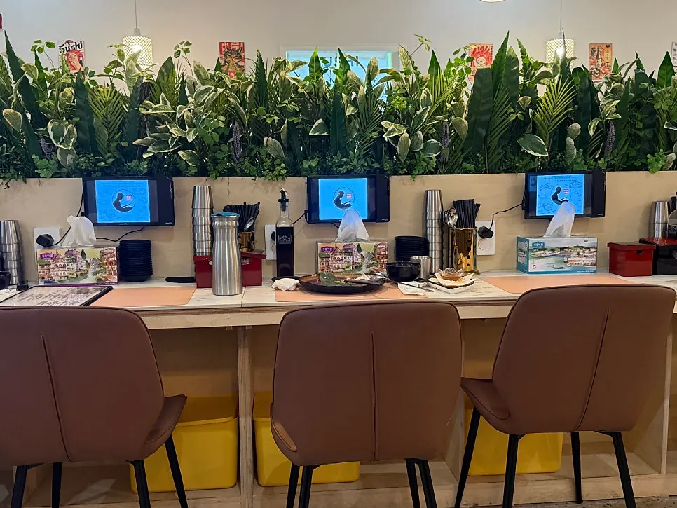 Row of solo-dining counter seats