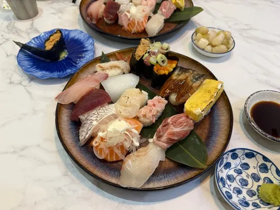 Clear soup and wasabi set out after being seated