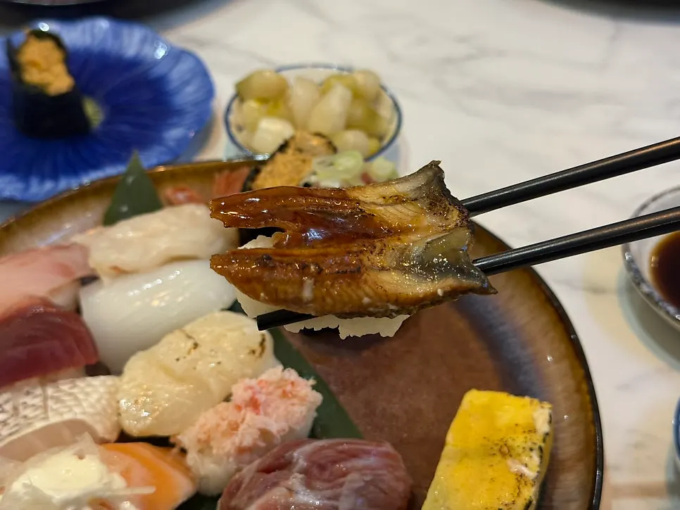 Eel sushi coated in sauce