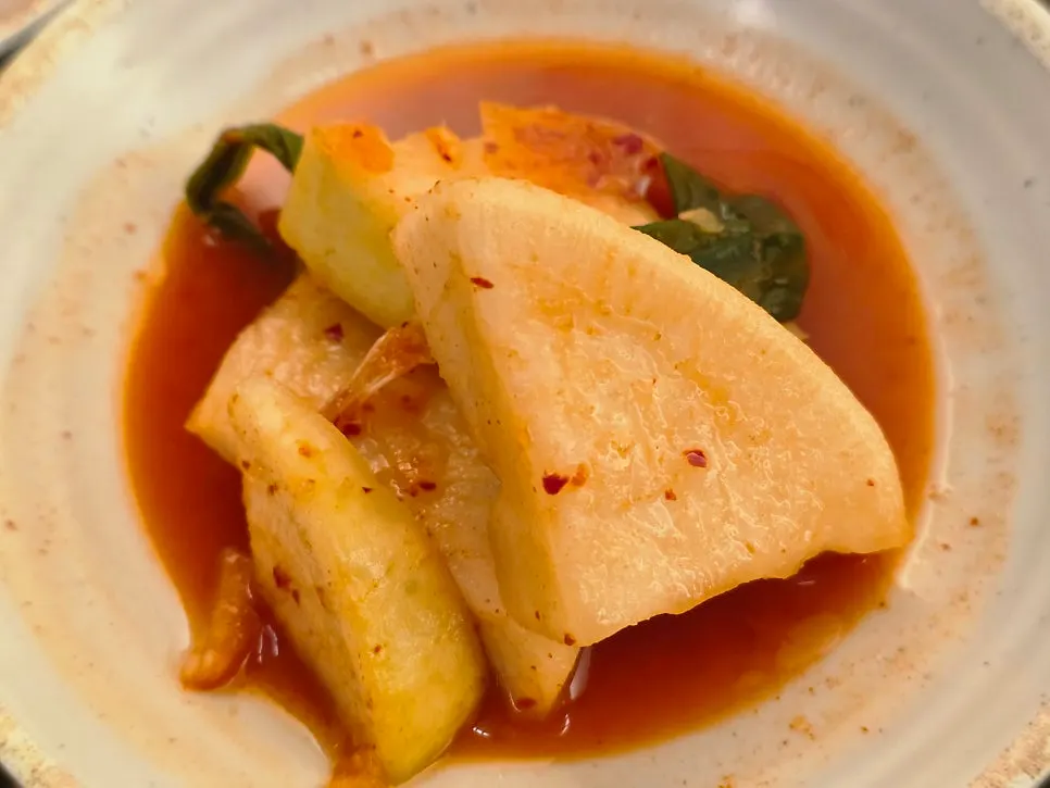 Fresh kimchi and kkakdugi set on the table