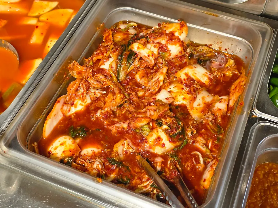 Kimchi and kkakdugi station at the self-serve bar