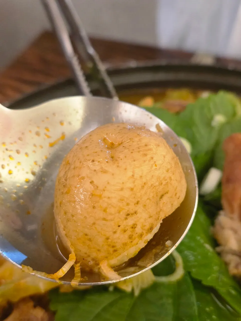 Ingredients in the gamjatang pot as it starts to boil