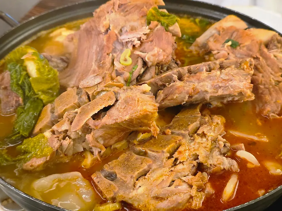 Big chunks of meat still left in the gamjatang pot