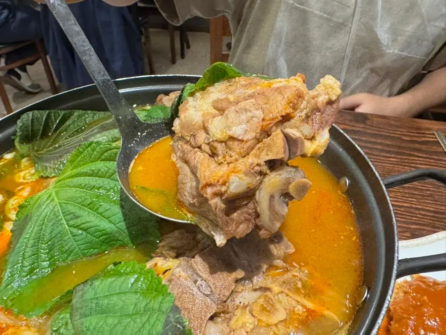Pot of gamjatang bubbling away