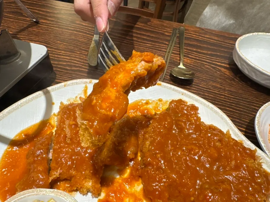 Pork cutlet neatly sliced and ready to eat