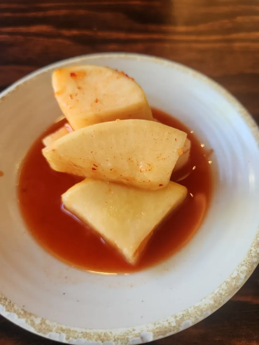 Kimchi and diced radish kimchi served as basic side dishes
