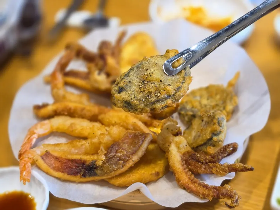 Cross-section of squid tempura showing the thick squid inside