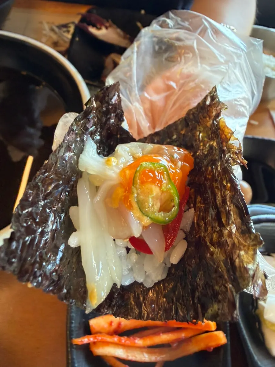 White rice and crab wrapped in seaweed