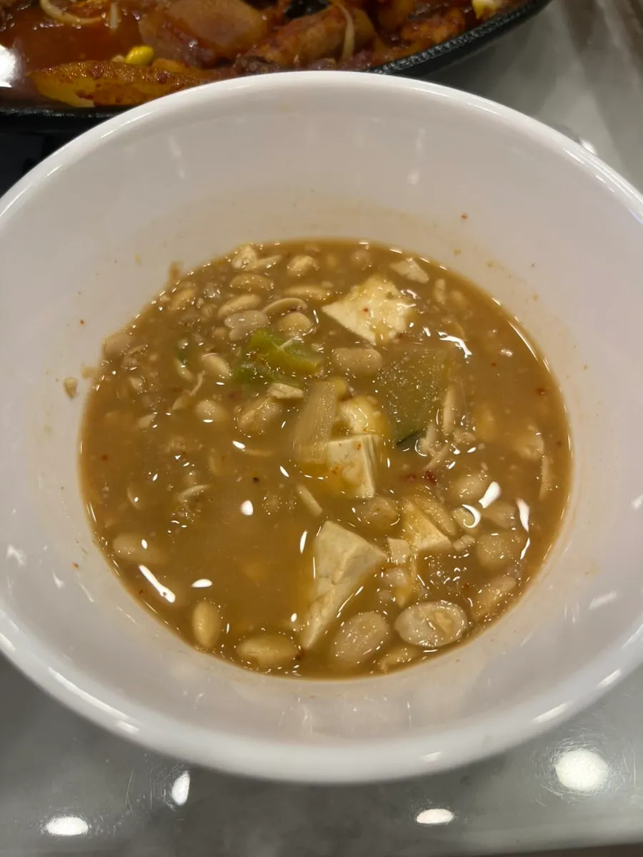 Pork octopus stir-fry simmering at Chongil Nakji