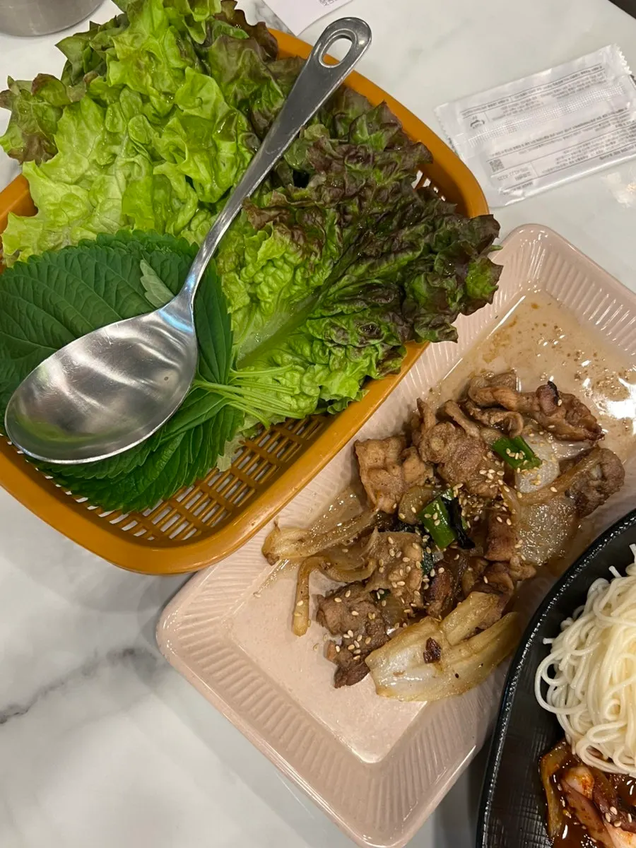 Octopus stir-fry served with wrap vegetables