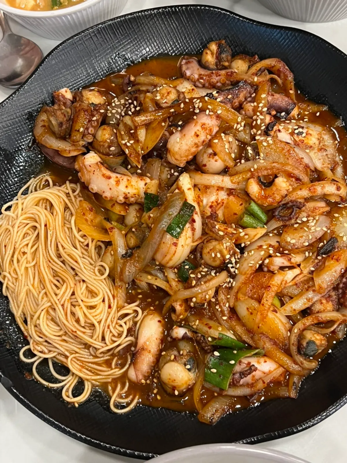 Scallop octopus stir-fry tossed in sauce