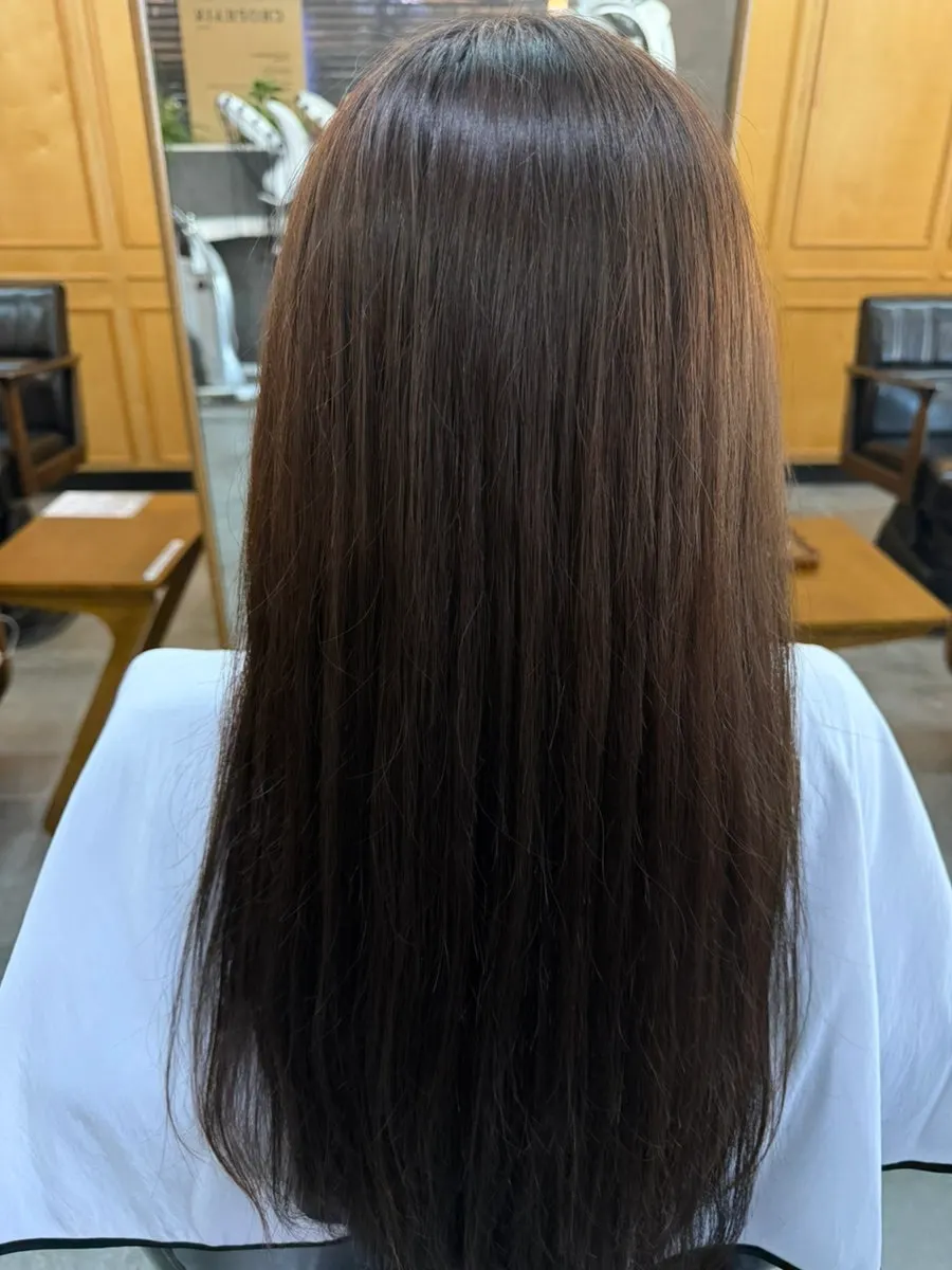Hair undergoing mist steam treatment